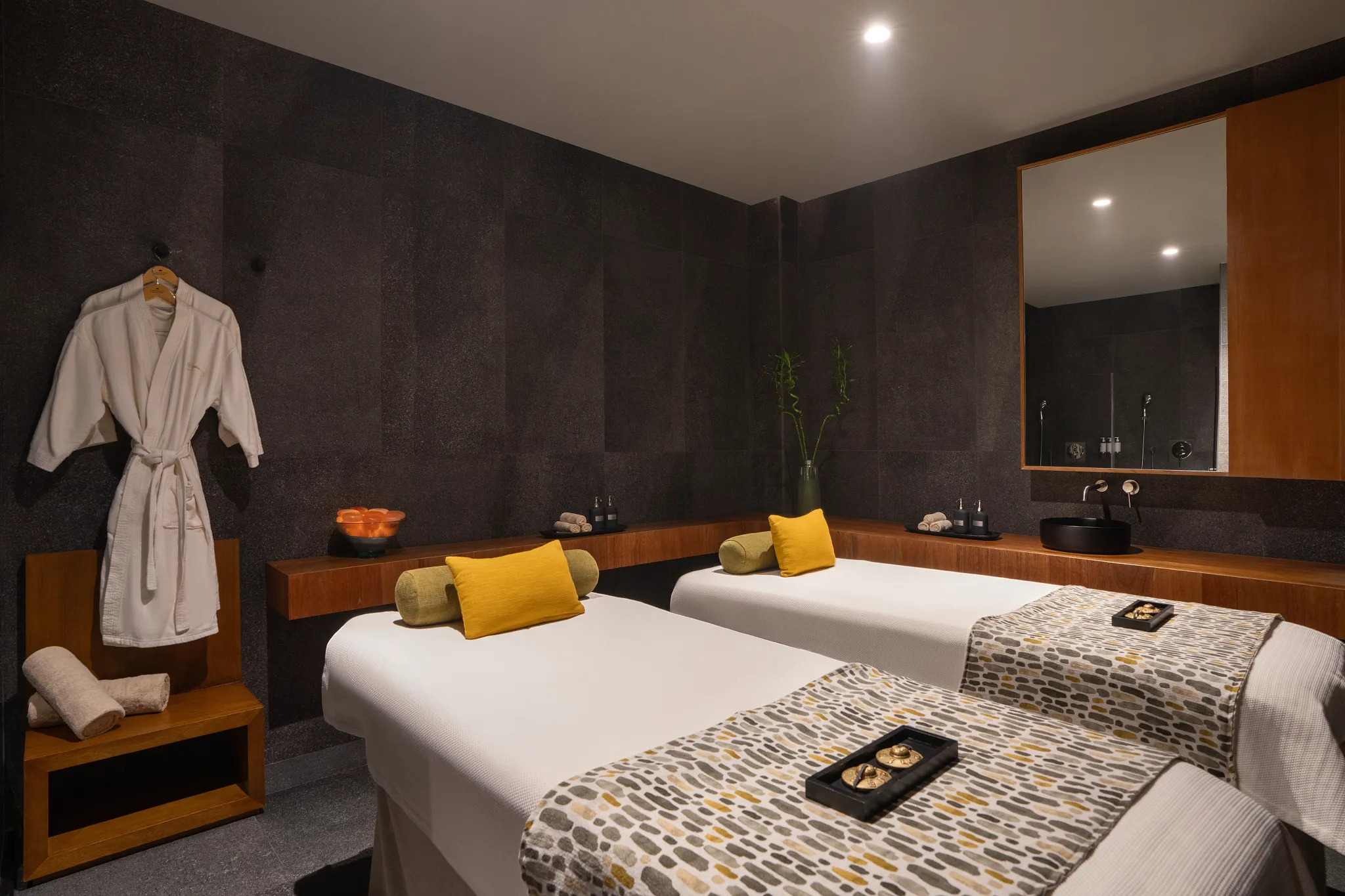 Spa treatment room with dual massage beds and calming decor at Dreams Flora Resort & Spa Punta Cana.