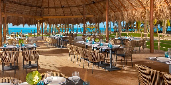 Seaside Grill palapa venue with ocean views at Dreams Flora Resort & Spa